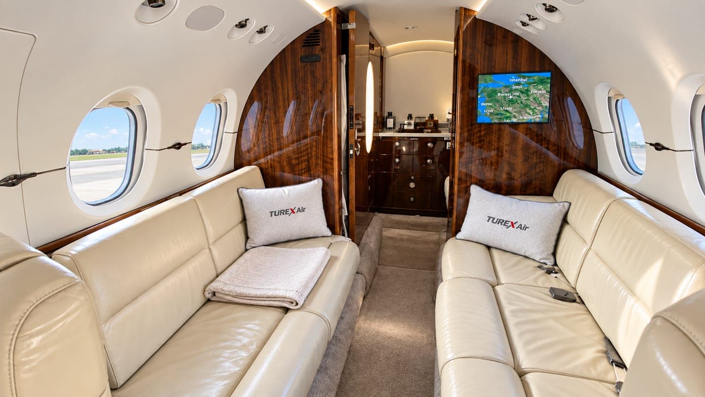 Leather divans and the aft galley area of the Hawker 800XP cabin