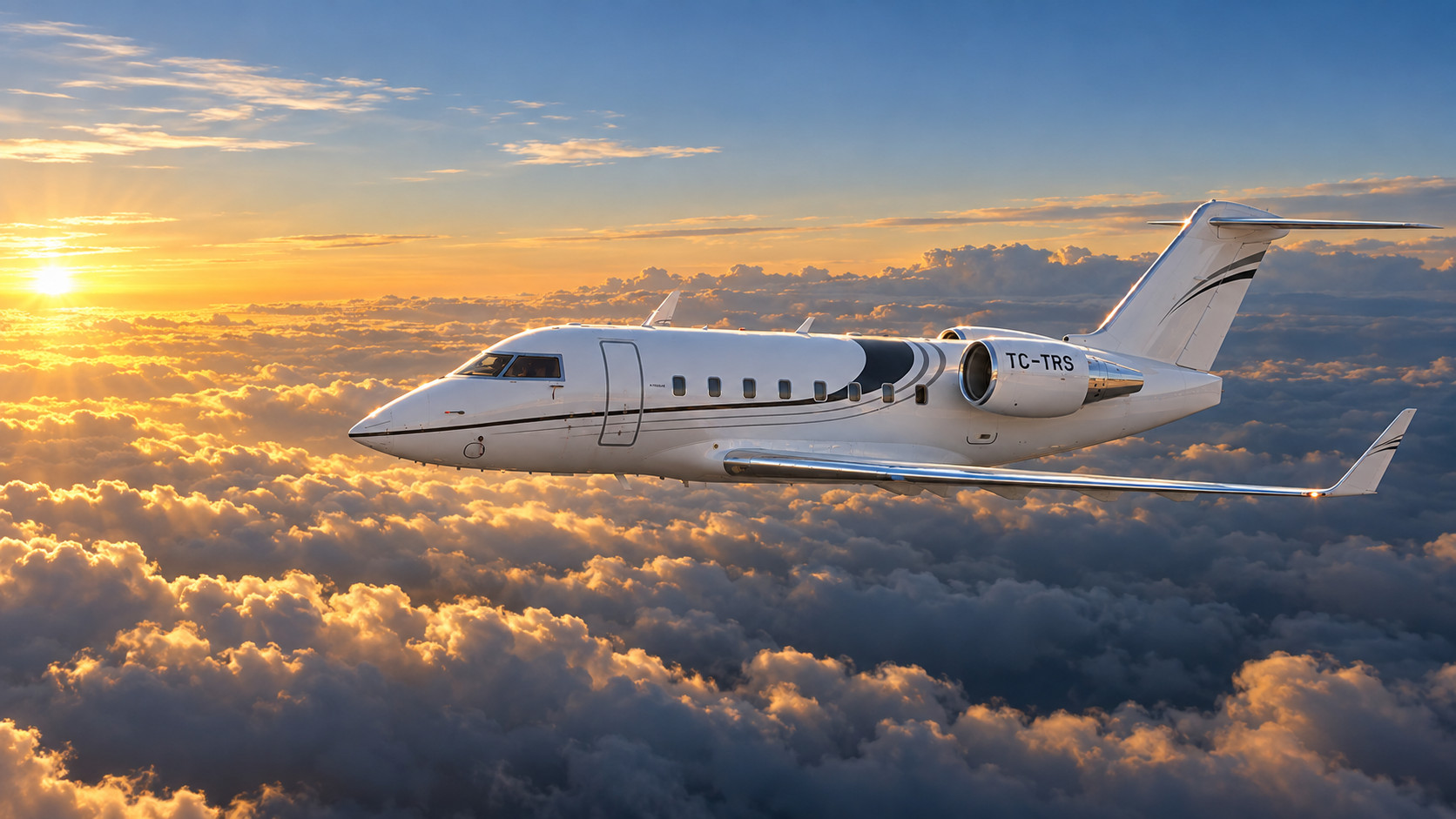 Turex Air Challenger 604 private jet (TC-TRS) flying above the clouds at sunset